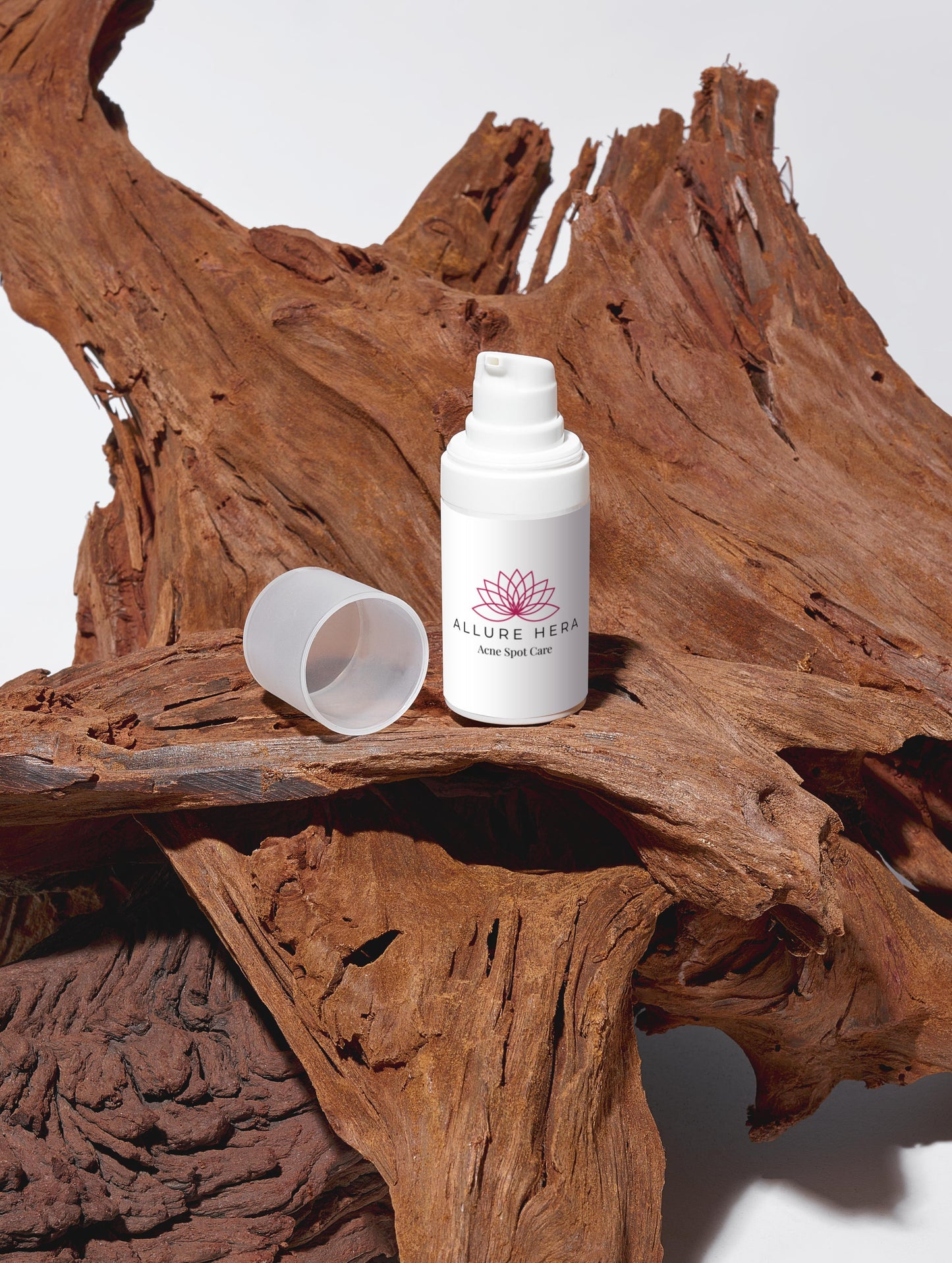 White spray bottle with cap on a wooden surface