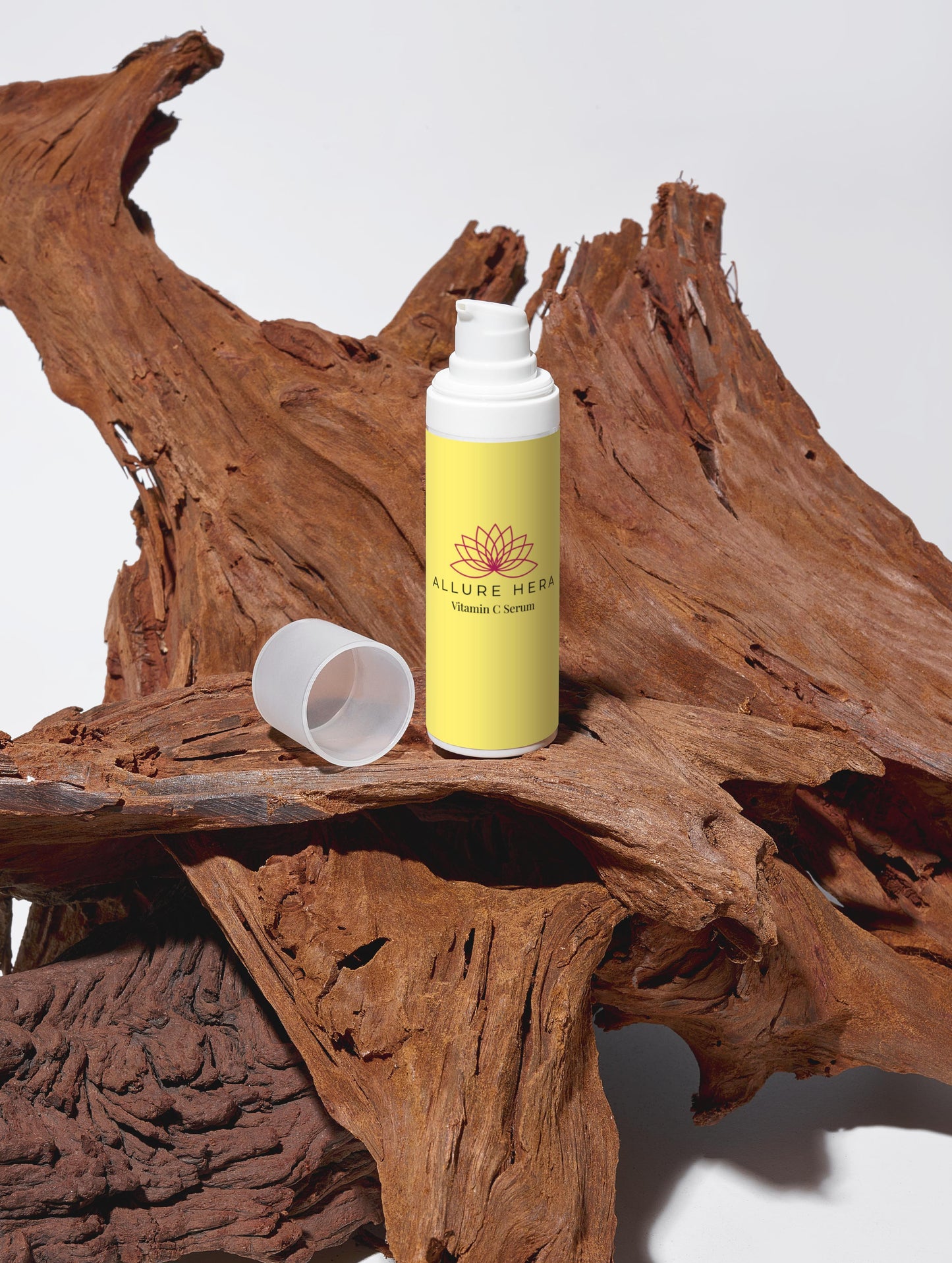 Skincare product with yellow label on a wooden surface