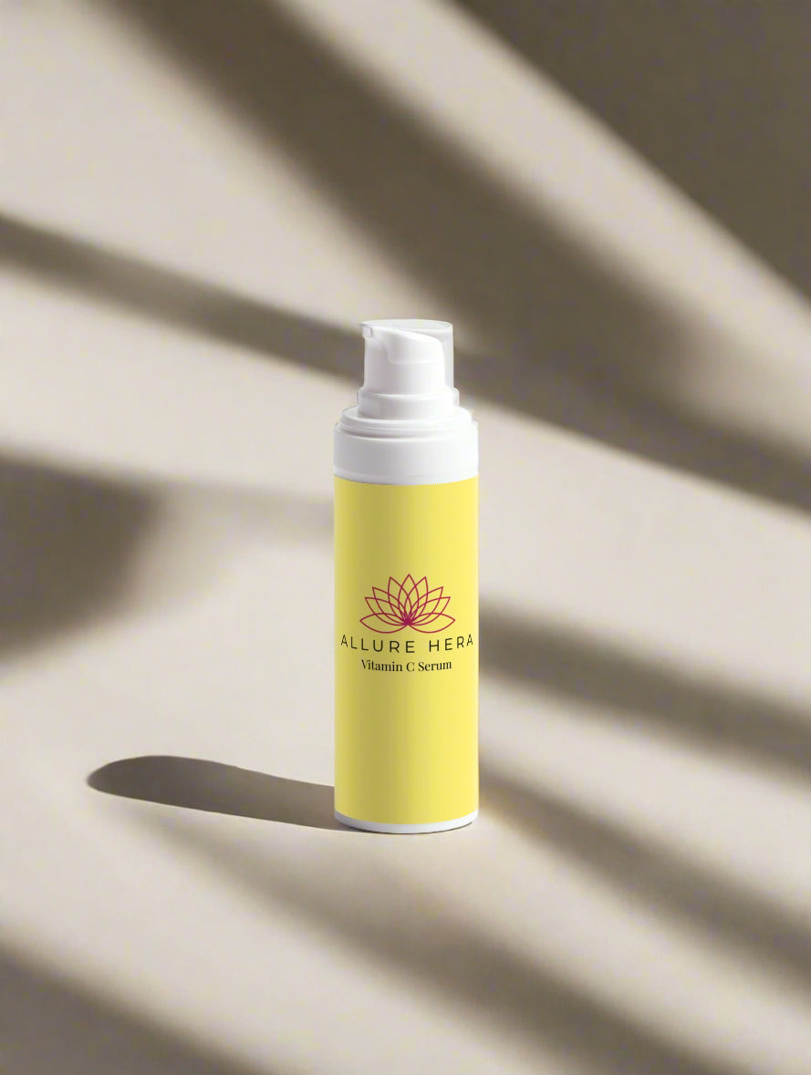 Yellow serum bottle with white cap on a light gray background