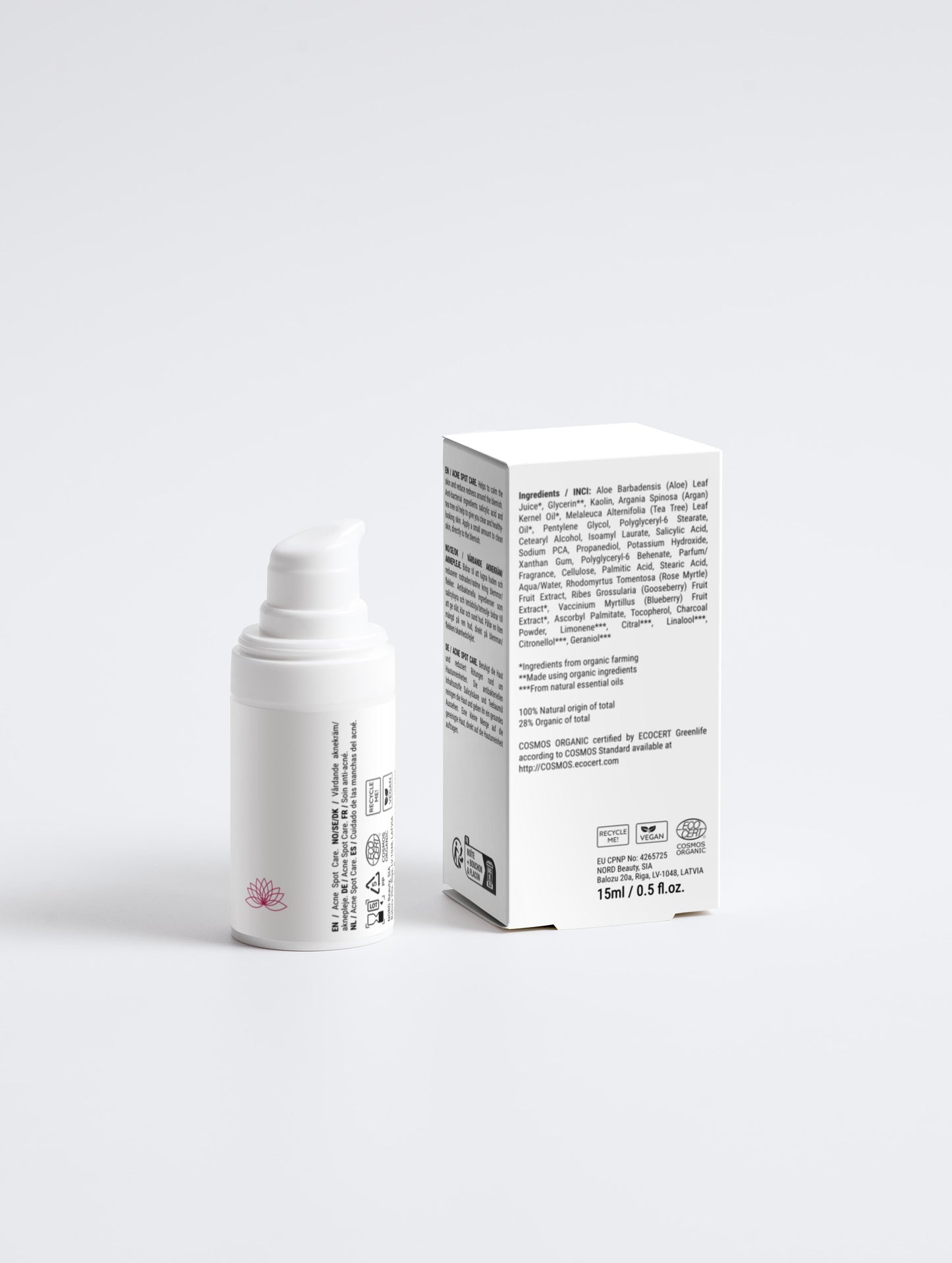 White skincare bottle and box on a light gray background