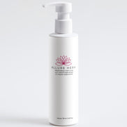 White bottle with pump of Allure Hera product on a white background