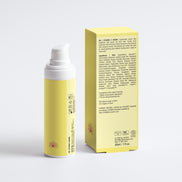 Yellow skincare product with packaging on a white background
