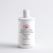 White shampoo bottle with 'Allure Hera' branding on a light gray background