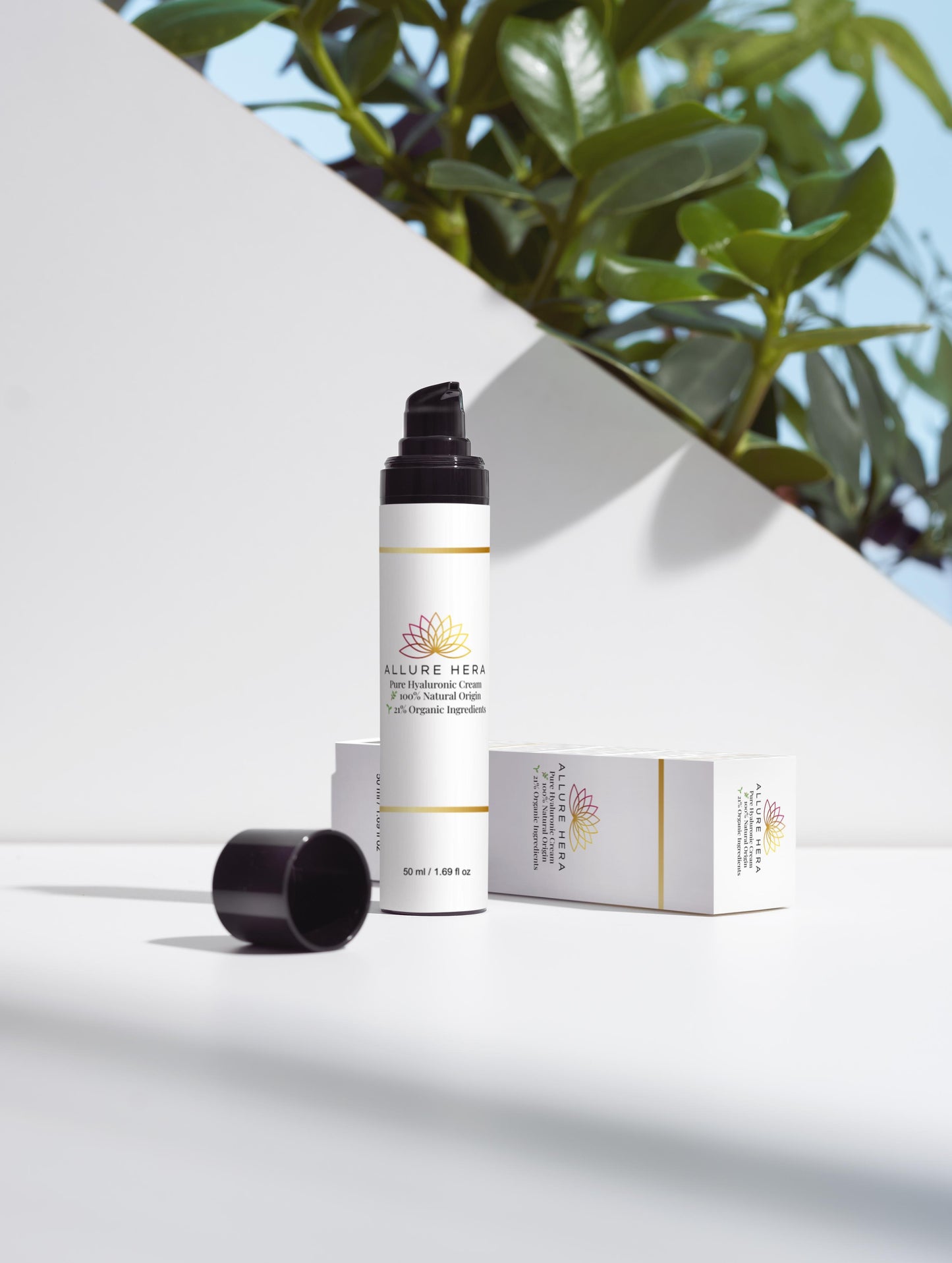 Pure Hyaluronic Cream in a sleek container, with a white box, displayed among green leaves for an organic aesthetic.