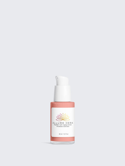 Skincare bottle with 'Allure Hera' label on a light gray background