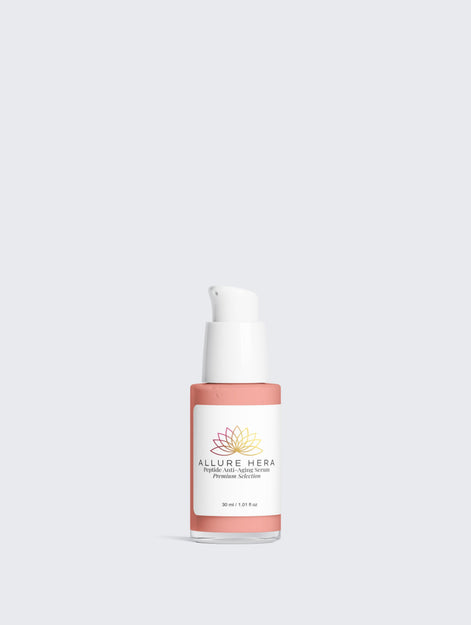 Skincare bottle with 'Allure Hera' label on a light gray background