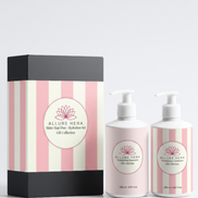 Allure Hera gift set with striped box and two bottles on a white background