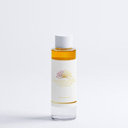 Bottle of Declure Herb skincare product on a white background