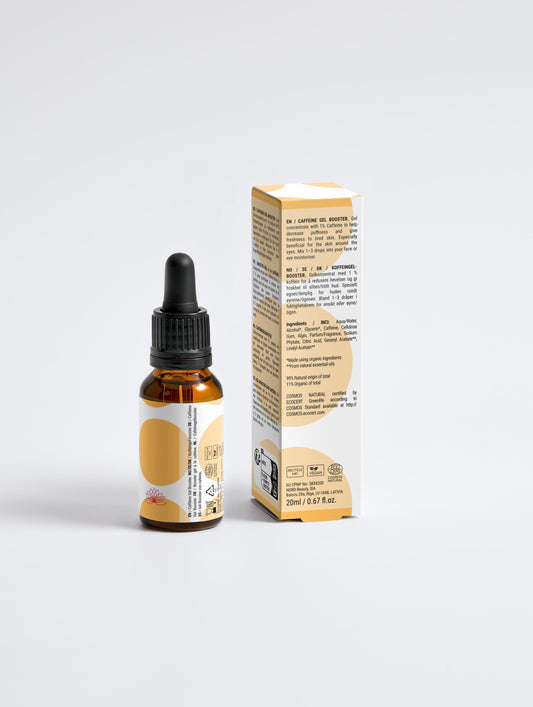 Bottle and box of a skincare product on a white background