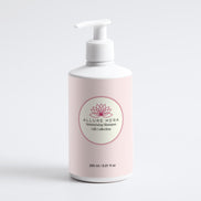 White shampoo bottle with pink label on a white background