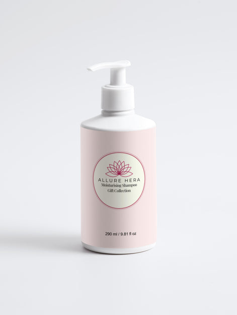 White shampoo bottle with pink label on a white background