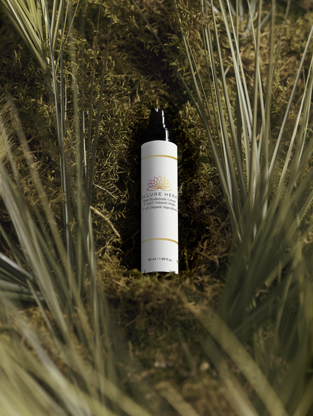 Pure Hyaluronic Cream bottle surrounded by lush green foliage, emphasizing natural and organic skincare.